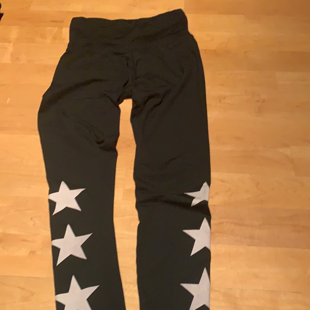 Black legging with star detail near bottom